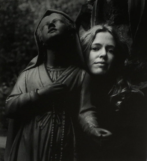 Untitled (Girl Posing With Statue St Bernadette) 1973 Photography by Imogen Cunningham Untitled (Girl Posing With Statue St Bernadette) 1973 Photography by Imogen Cunningham