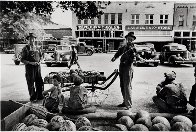 Melon Salesman And Fidler At a Marketplace in Scott, Mississippi Photography by Alfred Eisenstaedt - 1
