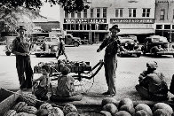 Melon Salesman And Fidler At a Marketplace in Scott, Mississippi Photography by Alfred Eisenstaedt - 0 Melon Salesman And Fidler At a Marketplace in Scott, Mississippi Photography by Alfred Eisenstaedt - 0